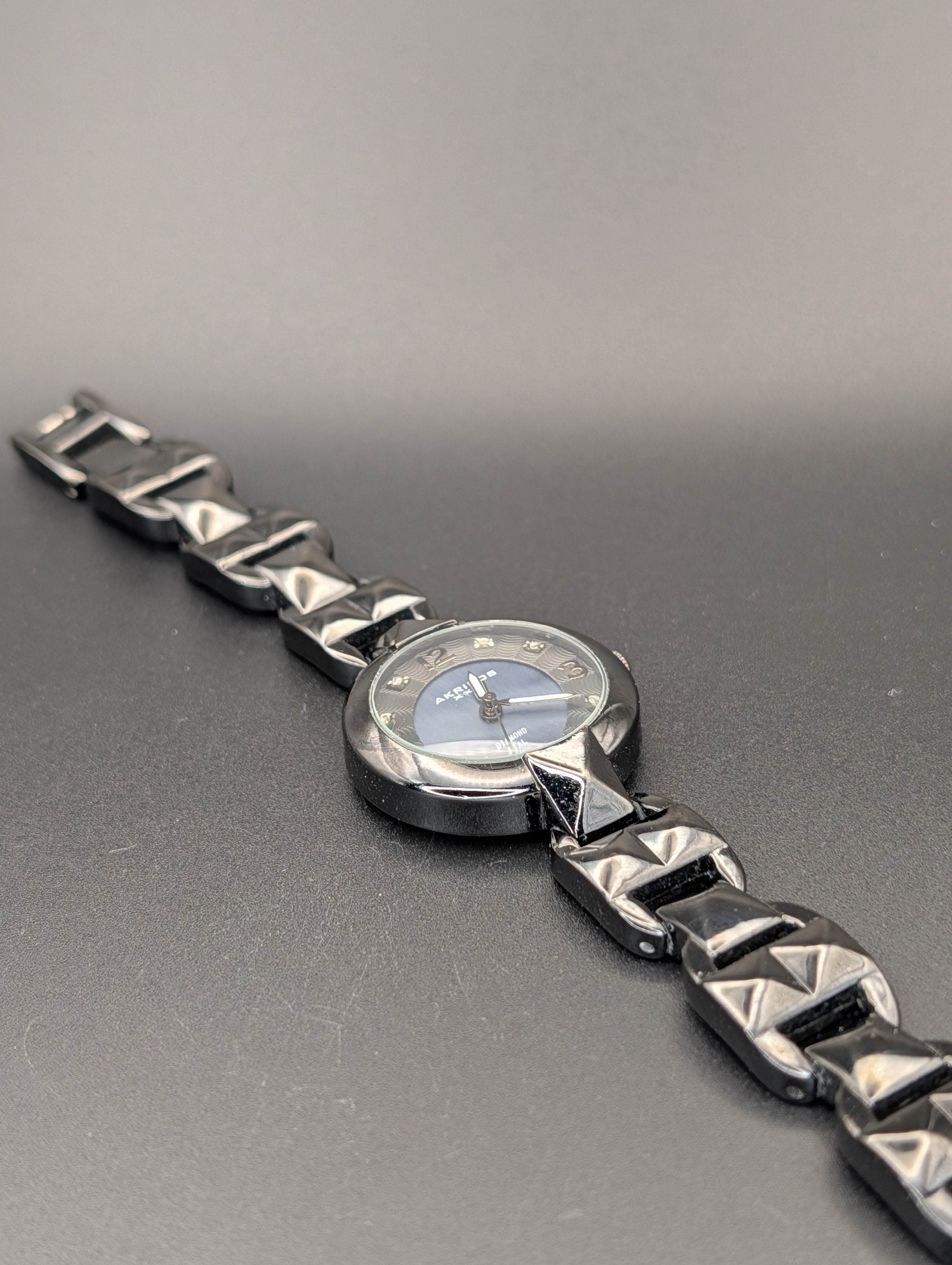 Akribos Diamond and Studs Women's Quartz Watch